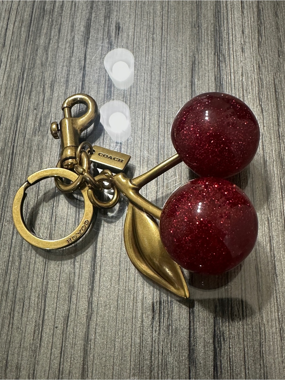 Coach Glitter Cherry Key Charm in Red with Antique Gold Hardware
